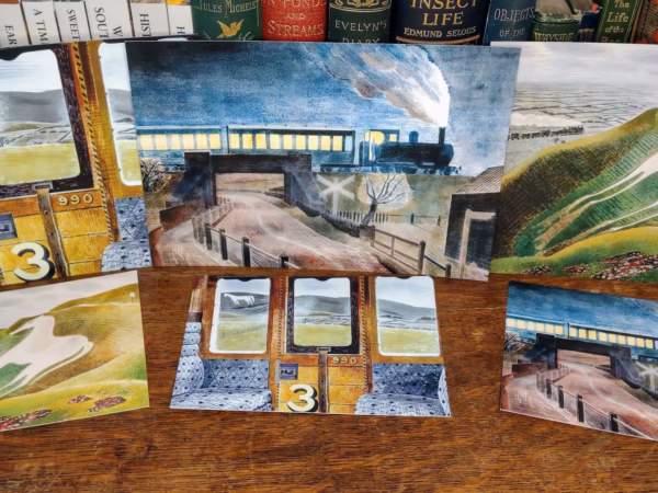 Panel showing Eric Ravilious paintings ‘Train Landscape’, ‘Train going over a Bridge at Night’ and ‘Westbury Horse’